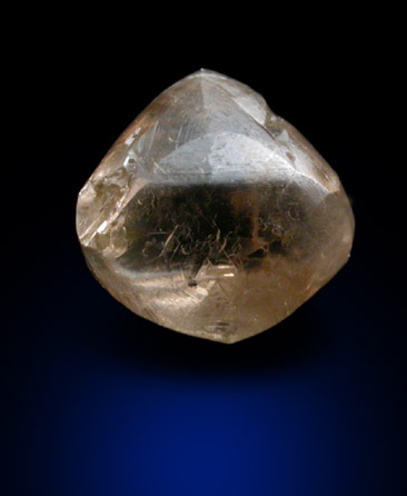 Diamond (0.84 carat brown octahedral crystal) from Oranjemund District, southern coastal Namib Desert, Namibia