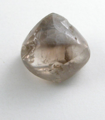 Diamond (0.84 carat brown octahedral crystal) from Oranjemund District, southern coastal Namib Desert, Namibia