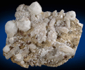 Analcime, Natrolite, Rhodochrosite, Gonnardite from De-Mix Quarry, Mont Saint-Hilaire, Québec, Canada