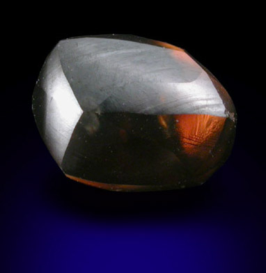 Diamond (1.47 carat red-brown elongated crystal) from Majhgawan Pipe, near Panna, Madhya Pradesh, India