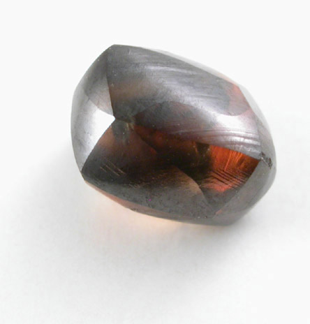 Diamond (1.47 carat red-brown elongated crystal) from Majhgawan Pipe, near Panna, Madhya Pradesh, India