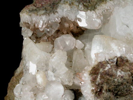 Apophyllite, Heulandite, Calcite, Quartz with minor Hematite from Paterson (New Street Quarry), Paterson, Passaic County, New Jersey