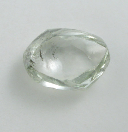 Diamond (0.66 carat pale-green flattened crystal) from Premier Mine, Gauteng Province, South Africa