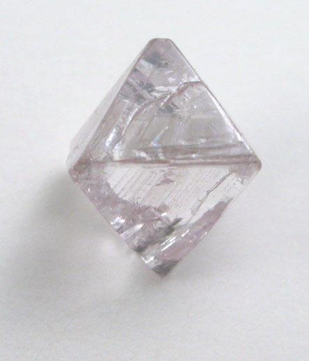 Diamond (0.60 carat purple-pink octahedral crystal) from Argyle Mine, Kimberley, Western Australia, Australia