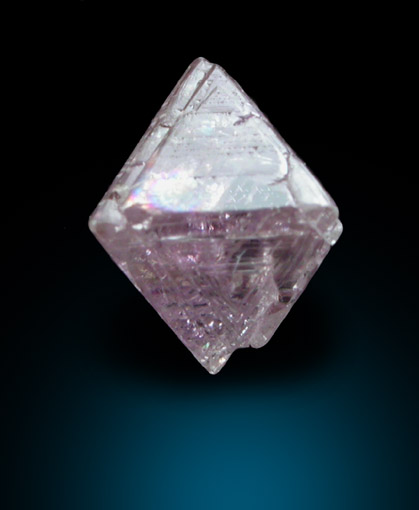 Diamond (0.61 carat purple-pink octahedral crystal) from Argyle Mine, Kimberley, Western Australia, Australia