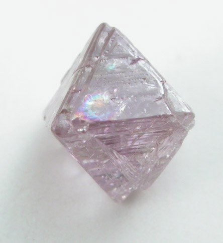 Diamond (0.61 carat purple-pink octahedral crystal) from Argyle Mine, Kimberley, Western Australia, Australia