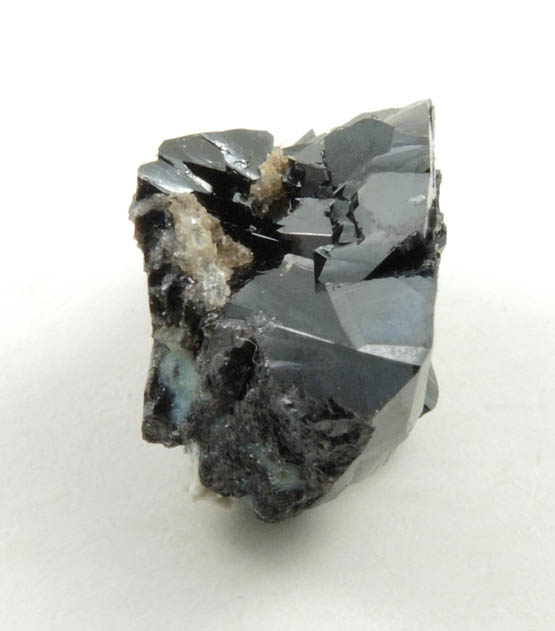 Cassiterite (twinned crystals) from Emmons Quarry, southeastern slope of Uncle Tom Mountain,  Greenwood, Oxford County, Maine