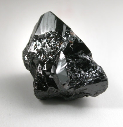 Cassiterite (twinned crystals) from Emmons Quarry, southeastern slope of Uncle Tom Mountain,  Greenwood, Oxford County, Maine