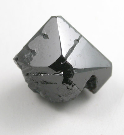 Cassiterite (twinned crystals) from Emmons Quarry, southeastern slope of Uncle Tom Mountain,  Greenwood, Oxford County, Maine