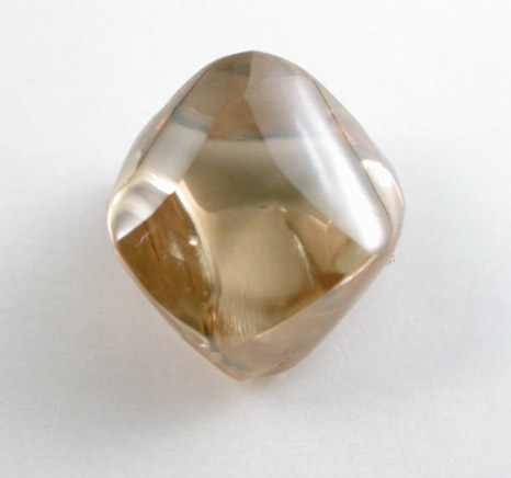 Diamond (1.41 carat gem-grade orange-brown octahedral crystal) from Orapa Mine, south of the Makgadikgadi Pans, Botswana