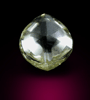 Diamond (0.85 carat gem-grade green-yellow tetrahexahedral crystal) from Orapa Mine, south of the Makgadikgadi Pans, Botswana