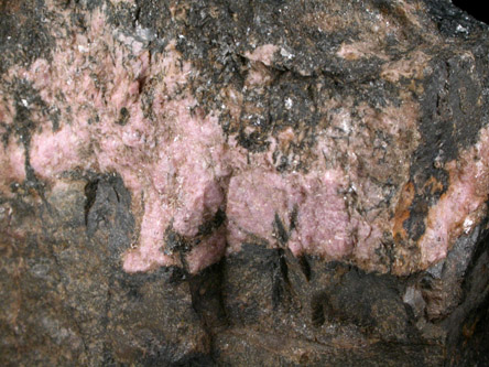Rhodonite, Bustamite in Manganese Ore from Treburland Manganese Mine, Bodmin Moor, Cornwall, England