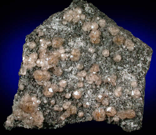 Grossular Garnet with Apophyllite, Albite, Diopside, Pyrrhotite from Jeffrey Mine, Asbestos, Qubec, Canada