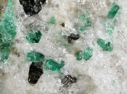 Beryl var. Emerald with Schorl Tourmaline in Quartz from Crabtree Mine, Spruce Pine District, Mitchell County, North Carolina