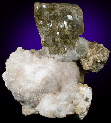 Siderite on Calcite from Poudrette Quarry, Mont Saint-Hilaire, Qubec, Canada