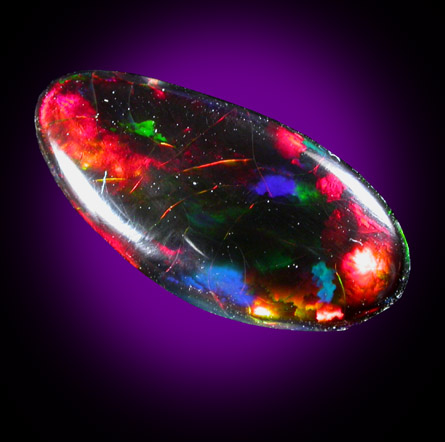 Opal (irregular oval cabochon) from Australia