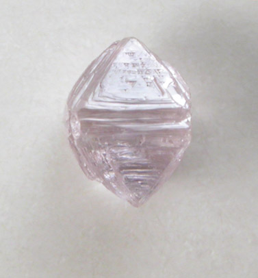 Diamond (0.18 carat pink octahedral crystal) from Argyle Mine, Kimberley, Western Australia, Australia
