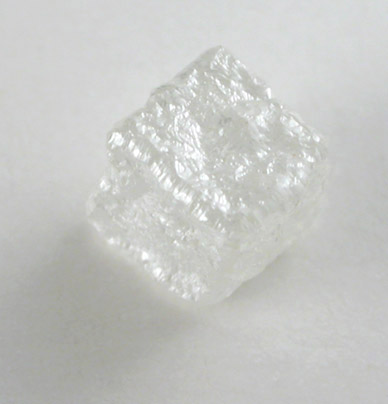 Diamond (0.58 carat colorless cubic crystal) from Magna Egoli Mine, Zimmi property along the Sewa River, Sierra Leone