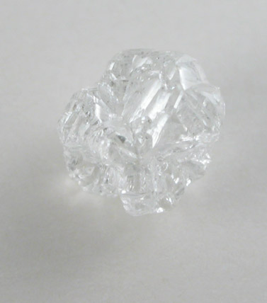 Diamond (0.73 carat colorless cubic crystal) from Magna Egoli Mine, Zimmi property along the Sewa River, Sierra Leone