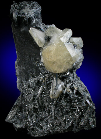 Calcite with Stibnite from Xikuangshan, 12 km northeast of Lengshuijiang, Hunan Province, China