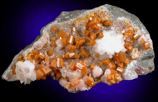 Wulfenite on Calcite from Sierra de Los Lamentos, Chihuahua, Mexico