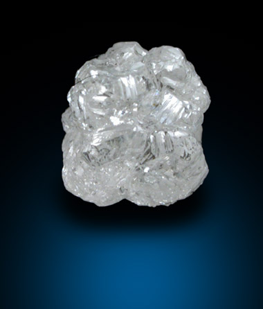 Diamond (0.73 carat colorless complex crystal cluster) from Magna Egoli Mine, Zimmi property along the Sewa River, Sierra Leone