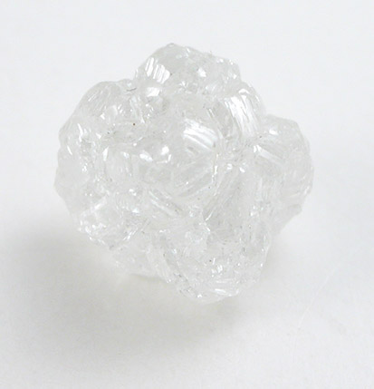 Diamond (0.73 carat colorless complex crystal cluster) from Magna Egoli Mine, Zimmi property along the Sewa River, Sierra Leone