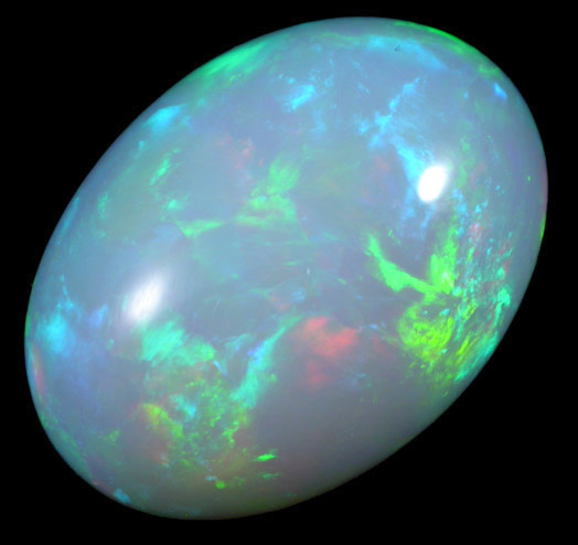 Opal var. Crystal Fire Opal (cabochon and rough) from 570 km north of Addis Ababa, Wello (Wollo), Delanta Plateau, Tigray, Ethiopia