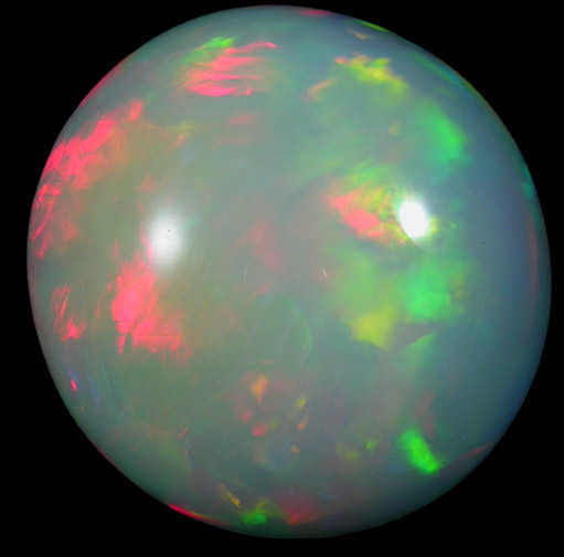 Opal (var. Crystal Fire Opal) from 570 km north of Addis Ababa, Wello (Wollo), Delanta Plateau, Tigray, Ethiopia