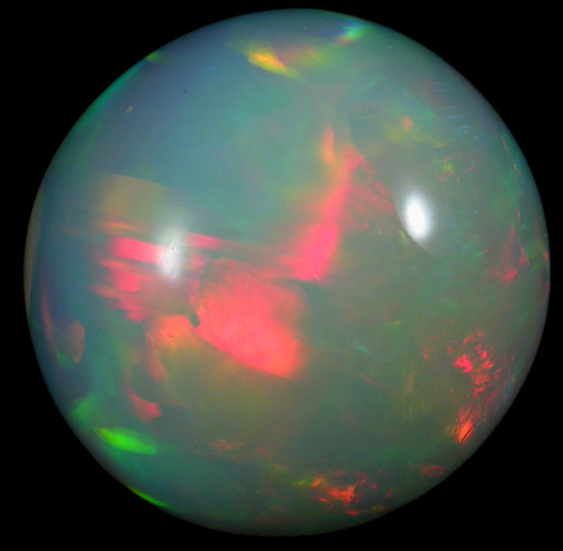 Opal (var. Crystal Fire Opal) from 570 km north of Addis Ababa, Wello (Wollo), Delanta Plateau, Tigray, Ethiopia