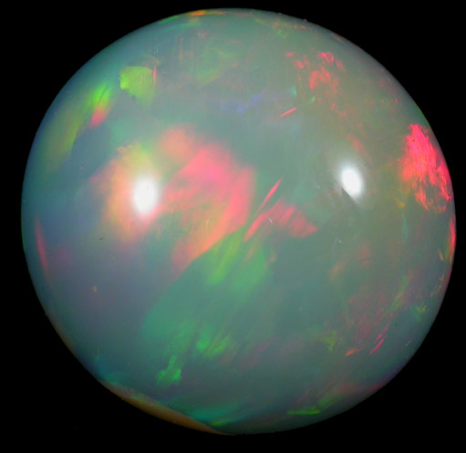 Opal (var. Crystal Fire Opal) from 570 km north of Addis Ababa, Wello (Wollo), Delanta Plateau, Tigray, Ethiopia