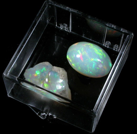Opal var. Crystal Fire Opal (cabochon and rough) from 570 km north of Addis Ababa, Wello (Wollo), Delanta Plateau, Tigray, Ethiopia