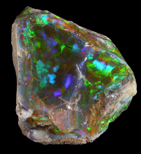 Opal (var. Crystal Fire Opal) from 570 km north of Addis Ababa, Wello (Wollo), Delanta Plateau, Tigray, Ethiopia