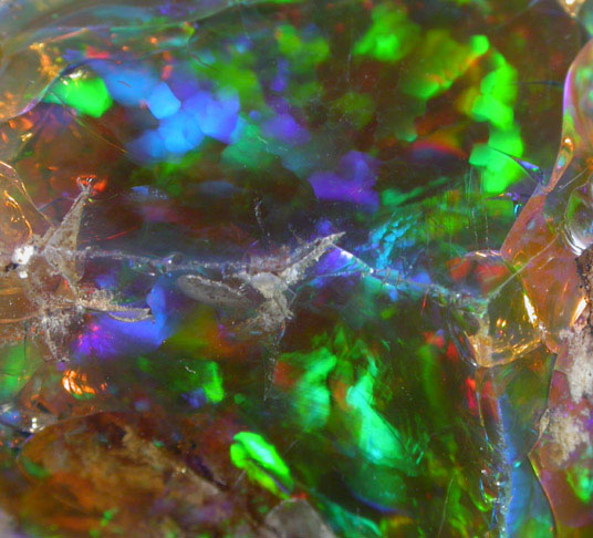 Opal (var. Crystal Fire Opal) from 570 km north of Addis Ababa, Wello (Wollo), Delanta Plateau, Tigray, Ethiopia