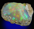 Opal (var. Crystal Fire Opal) from 570 km north of Addis Ababa, Wello (Wollo), Delanta Plateau, Tigray, Ethiopia