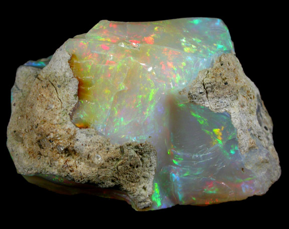 Opal (var. Crystal Fire Opal) from 570 km north of Addis Ababa, Wello (Wollo), Delanta Plateau, Tigray, Ethiopia