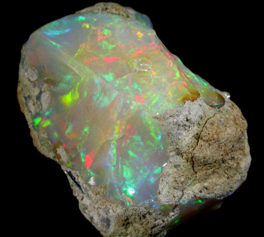 Opal (var. Crystal Fire Opal) from 570 km north of Addis Ababa, Wello (Wollo), Delanta Plateau, Tigray, Ethiopia