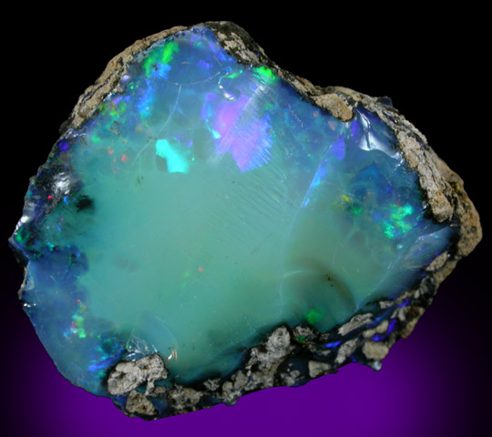 Opal (var. Crystal Fire Opal) from 570 km north of Addis Ababa, Wello (Wollo), Delanta Plateau, Tigray, Ethiopia