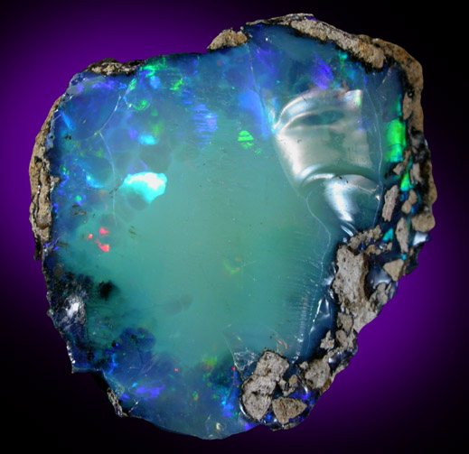 Opal (var. Crystal Fire Opal) from 570 km north of Addis Ababa, Wello (Wollo), Delanta Plateau, Tigray, Ethiopia