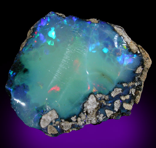 Opal (var. Crystal Fire Opal) from 570 km north of Addis Ababa, Wello (Wollo), Delanta Plateau, Tigray, Ethiopia