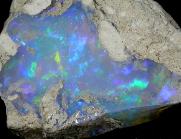 Opal (var. Crystal Fire Opal) from 570 km north of Addis Ababa, Wello (Wollo), Delanta Plateau, Tigray, Ethiopia