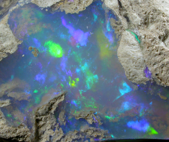 Opal (var. Crystal Fire Opal) from 570 km north of Addis Ababa, Wello (Wollo), Delanta Plateau, Tigray, Ethiopia