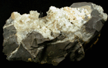 Millerite on Ankerite with Kaolinite var. Nacrite from Kladno, Bohemia, Czech Republic