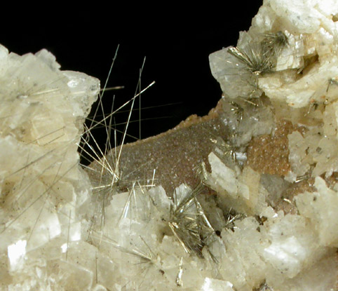 Millerite on Ankerite with Kaolinite var. Nacrite from Kladno, Bohemia, Czech Republic
