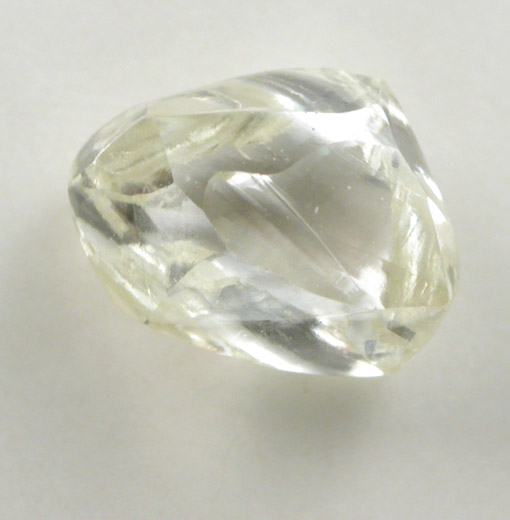 Diamond (0.97 carat pale-yellow elongated crystal) from Catoca Mine, Lunda Norte, Angola