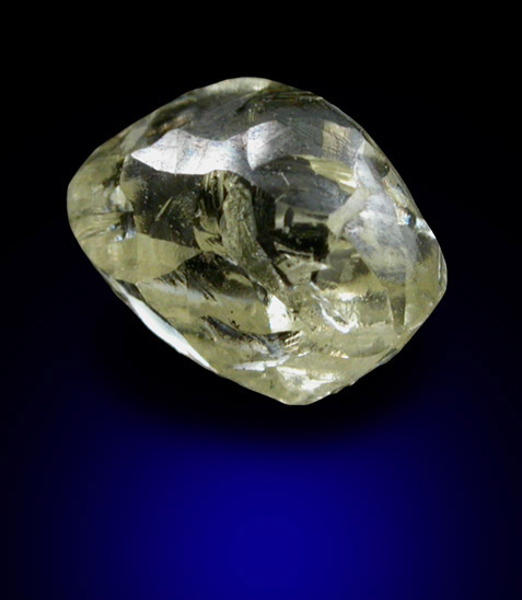 Diamond (0.86 carat yellow complex crystal) from Catoca Mine, Lunda Norte, Angola