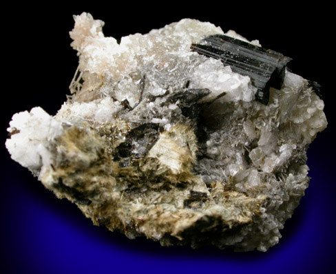 Leifite and Calcite with Aegirine from Poudrette Quarry, Mont Saint-Hilaire, Qubec, Canada