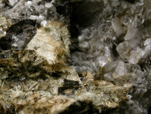 Leifite and Calcite with Aegirine from Poudrette Quarry, Mont Saint-Hilaire, Qubec, Canada