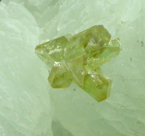 Sphalerite (Spinel-law twinned crystals) on Prehnite from Silliman Quarry, Southbury, New Haven County, Connecticut