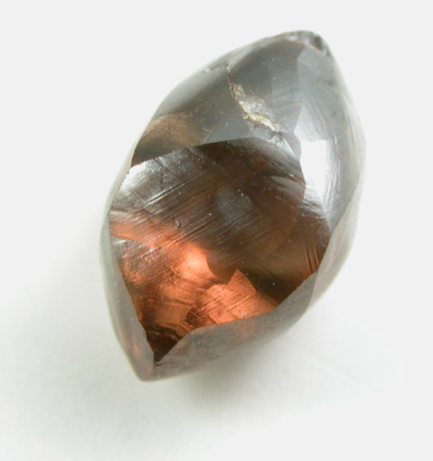 Diamond (2.76 carat dark-brown elongated crystal) from Diavik Mine, East Island, Lac de Gras, Northwest Territories, Canada